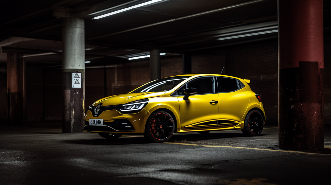 a yellow Renault Clio RS